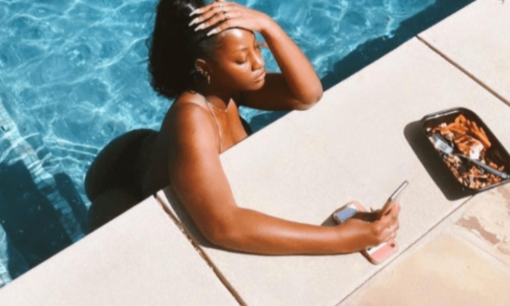 Singer Tems Causes Stir As She Flaunts Her Body In Bikini Photos