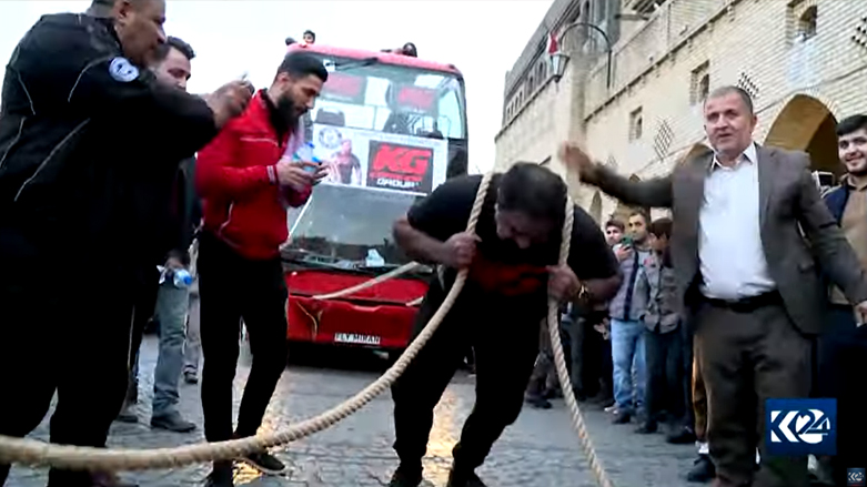 VIDEO: Bodybuilder Pulls Double-Decker Bus 169 Feet In Iraq