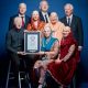 A British family of six brothers and sisters with albinism was awarded a Guinness World Record in the category of most albino siblings.