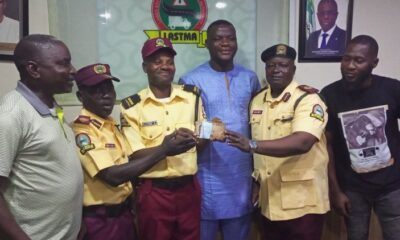 Photo: LASTMA Official Gets N100k Cash Gift For 'Channeling Flood With Bare Hands'