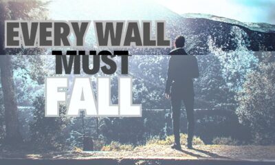 Wall must fall