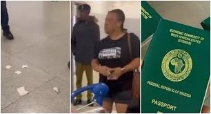 NOA woman Tore International Passport