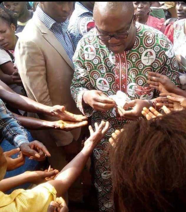 Peter Obi sharing money